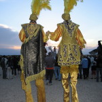 Tall poeple of the Nocturnes @ Versailles walk into the sunset